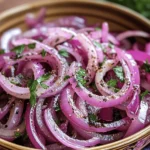 Zesty Sumac Onions are a vibrant and flavorful dish that brings a unique twist to traditional onion preparations. Originating from Middle Eastern cuisine, sumac has been cherished for centuries, not only for its bold flavor but also for its versatility in various culinary applications. This dish is a perfect example of how a few simple ingredients can come together to create something extraordinary. The tangy notes of sumac, paired with the sharpness of red onions, make this recipe a must-try for anyone looking to elevate their meals. Whether served as a side dish, a topping for grilled meats, or a refreshing addition to salads, Zesty Sumac Onions are sure to impress.