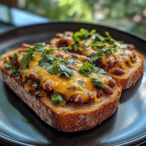 In the vast world of culinary experiences, few dishes manage to strike the perfect balance between comfort and flavor like Cheesy Masala Beans on Toast. This delightful recipe combines the hearty goodness of beans with the rich, melty indulgence of cheese, all resting on a crispy slice of toast. Its fusion of flavors is not only satisfying but also accessible, making it an ideal choice for a quick meal any time of the day.
