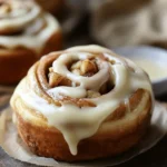 Imagine waking up on a cozy weekend morning, the sun softly streaming through the kitchen window, and the enticing aroma of freshly baked apple cinnamon rolls wafting through your home. This is precisely the scene you’ll create when you indulge in making these irresistible apple cinnamon rolls topped with creamy, luscious cream cheese frosting.