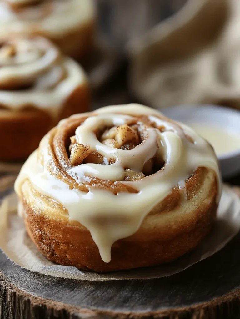 Imagine waking up on a cozy weekend morning, the sun softly streaming through the kitchen window, and the enticing aroma of freshly baked apple cinnamon rolls wafting through your home. This is precisely the scene you’ll create when you indulge in making these irresistible apple cinnamon rolls topped with creamy, luscious cream cheese frosting.